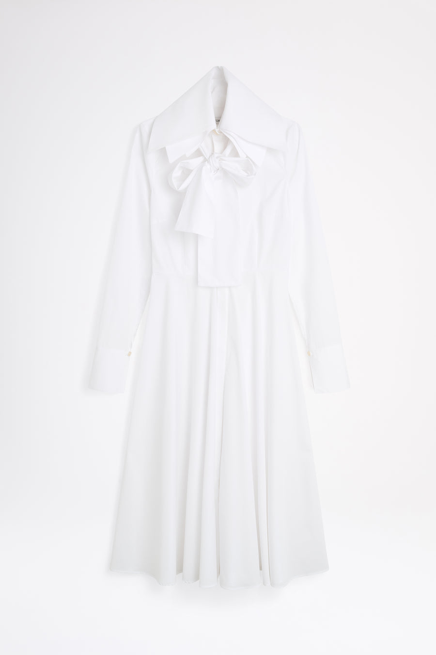 White halter neck dress on a light gray background