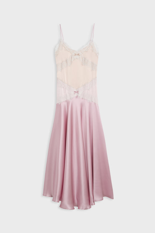 A pink satin slip dress with a pale pink lace bodice, thin spaghetti straps, and a flared skirt, shown against a light gray background.