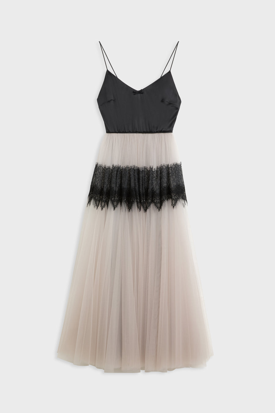 A sleeveless spaghetti-strap dress with a black bodice and a layered tulle skirt in pale blush and black lace, shown against a light gray background.