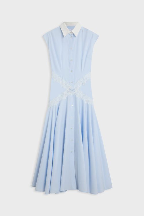A light blue sleeveless shirt dress with a white pointed collar, button front, and a white lace criss-cross detail at the waist, shown against a light gray background.
