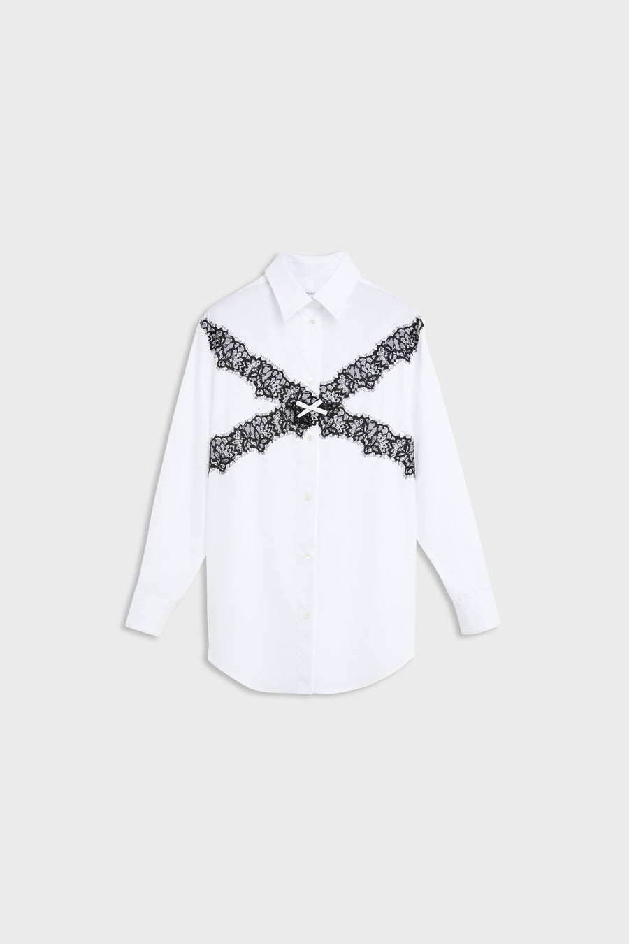 A white long-sleeve button-up shirt with a black lace X-shaped graphic across the chest, displayed flat against a light gray background.