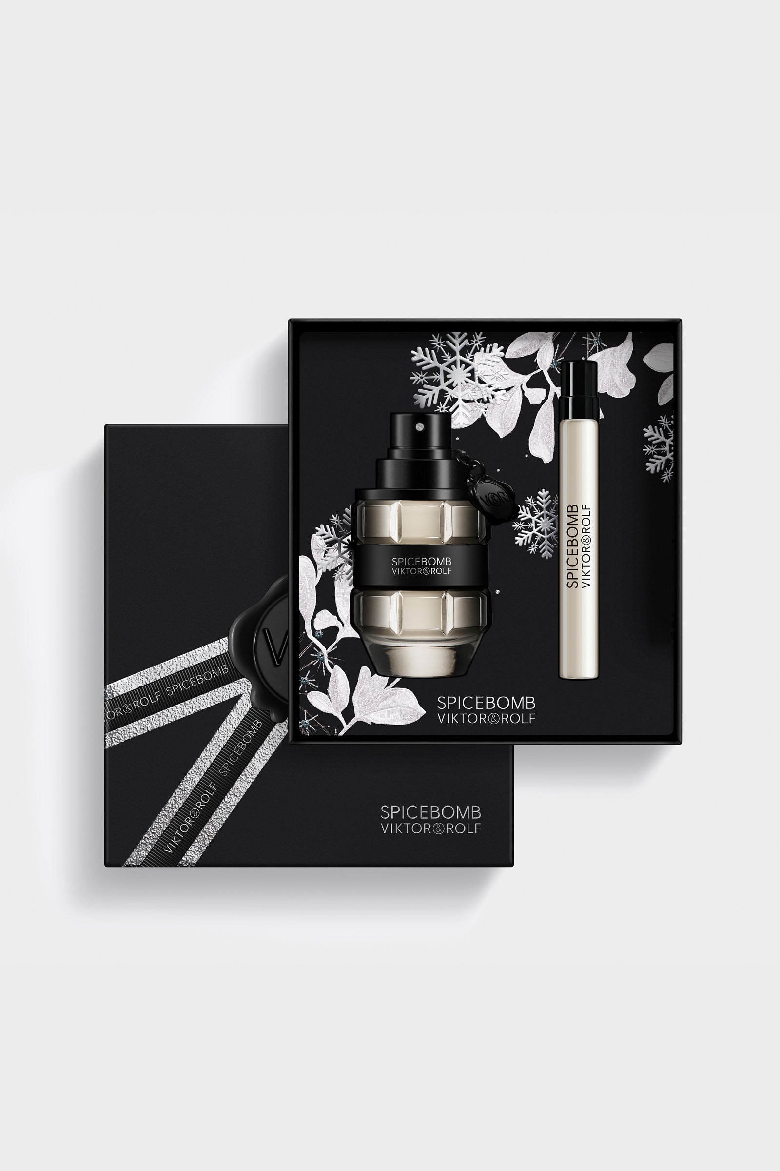 Spicebomb Eau de Toilette gift set for men by Viktor & Rolf, featuring grenade-shaped bottles with a bold black and silver design.