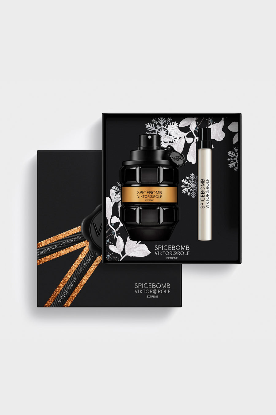 Spicebomb Extreme Eau de Parfum gift set for men by Viktor & Rolf with grenade-shaped bottle and sleek black packaging.