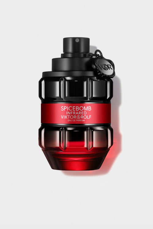 Grenade-shaped bottle of Spicebomb Infrared Eau de Parfum by Viktor & Rolf, sleek black and red design for men, exudes fiery spices.
